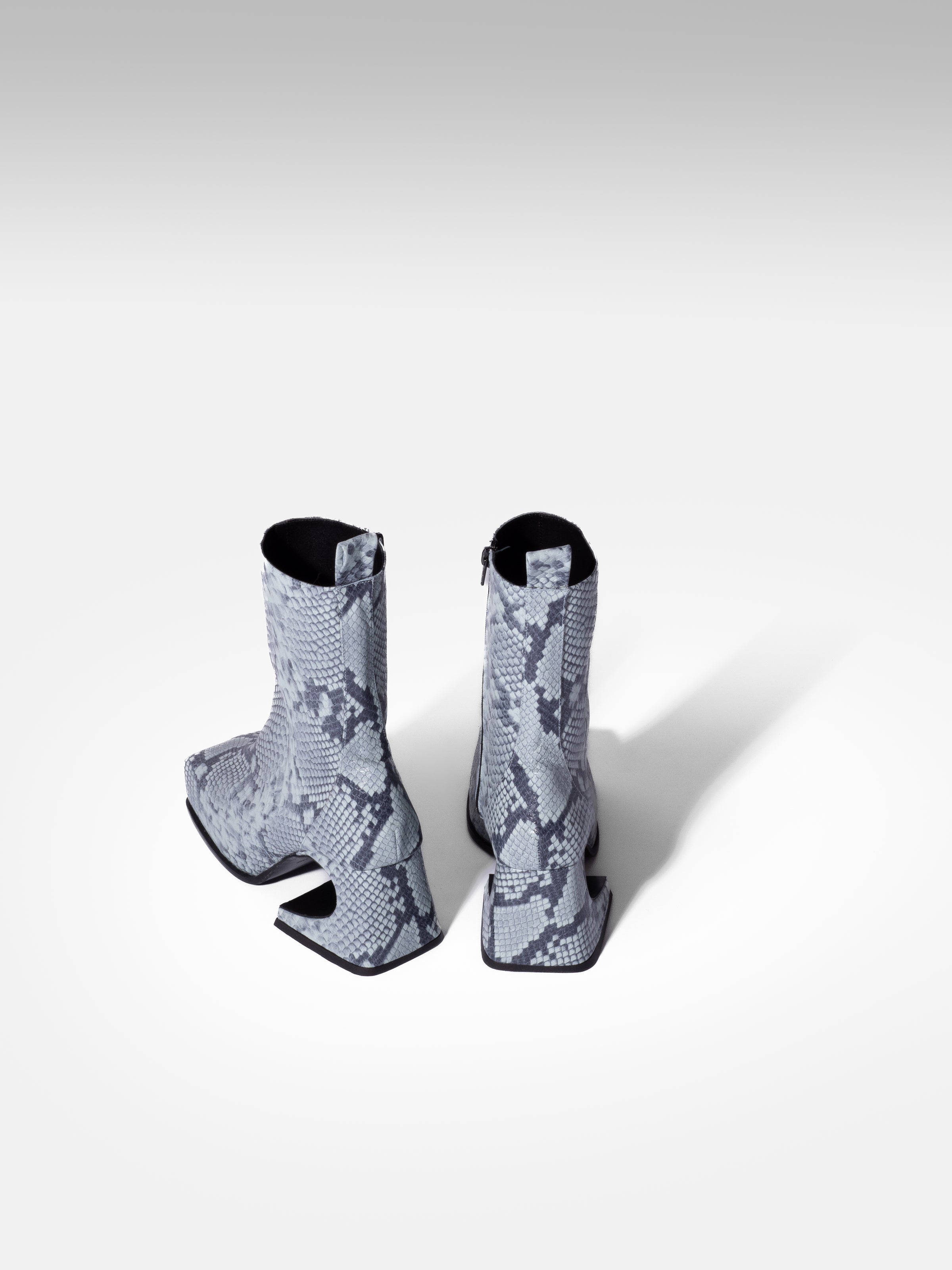 DENIM SNAKE ROXY BOOTS