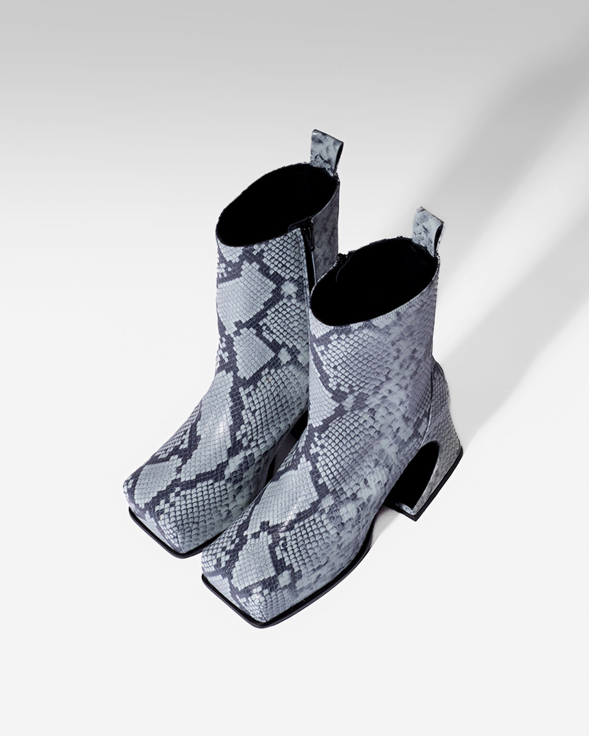 DENIM SNAKE ROXY BOOTS